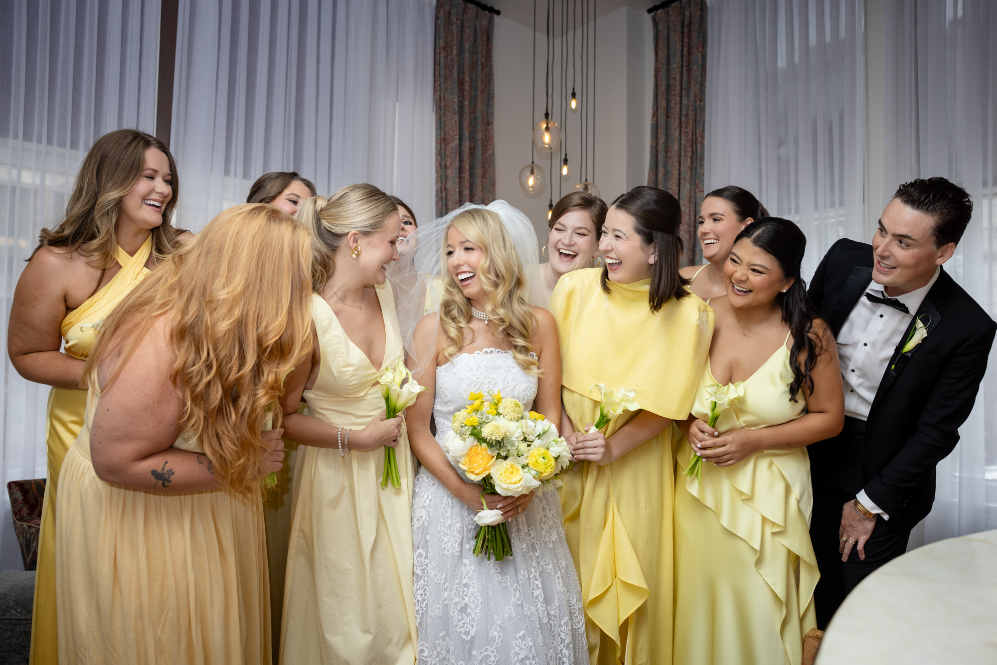 A first look with bridesmaids at the International House Hotel in New Orleans.