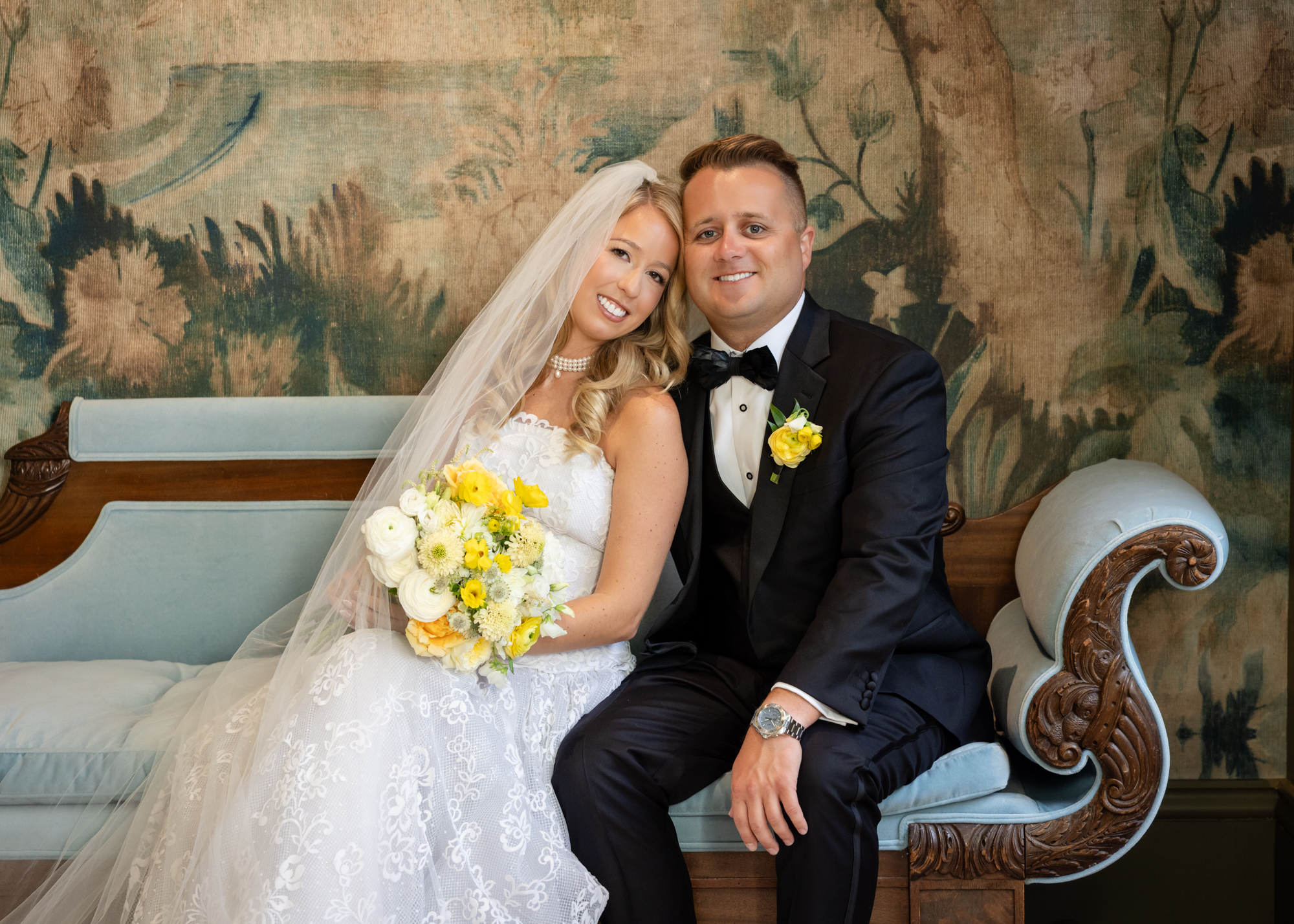 The bride and groom in the bridal suite of the New Orleans Board of Trade.