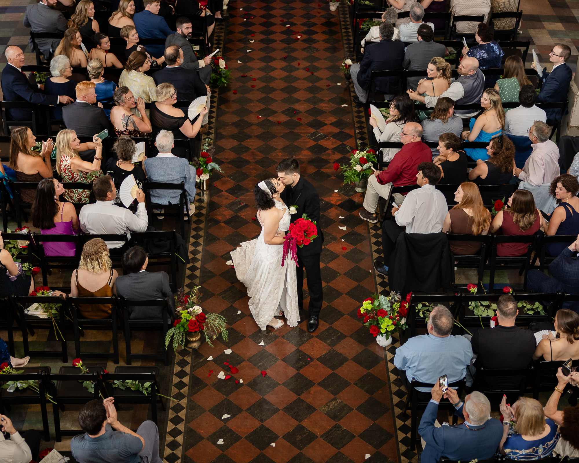 New Orleans Wedding Couple Kiss after the ceremony at the Marigny Opera House.